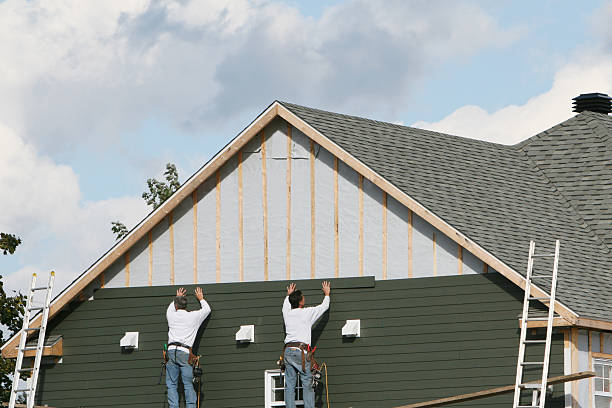 Professional Siding Replacement technician working in Port Jefferson, NY